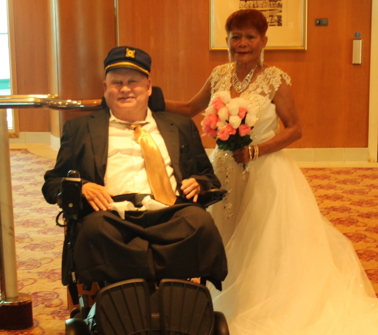 Donald and Edna posing in wedding attire.